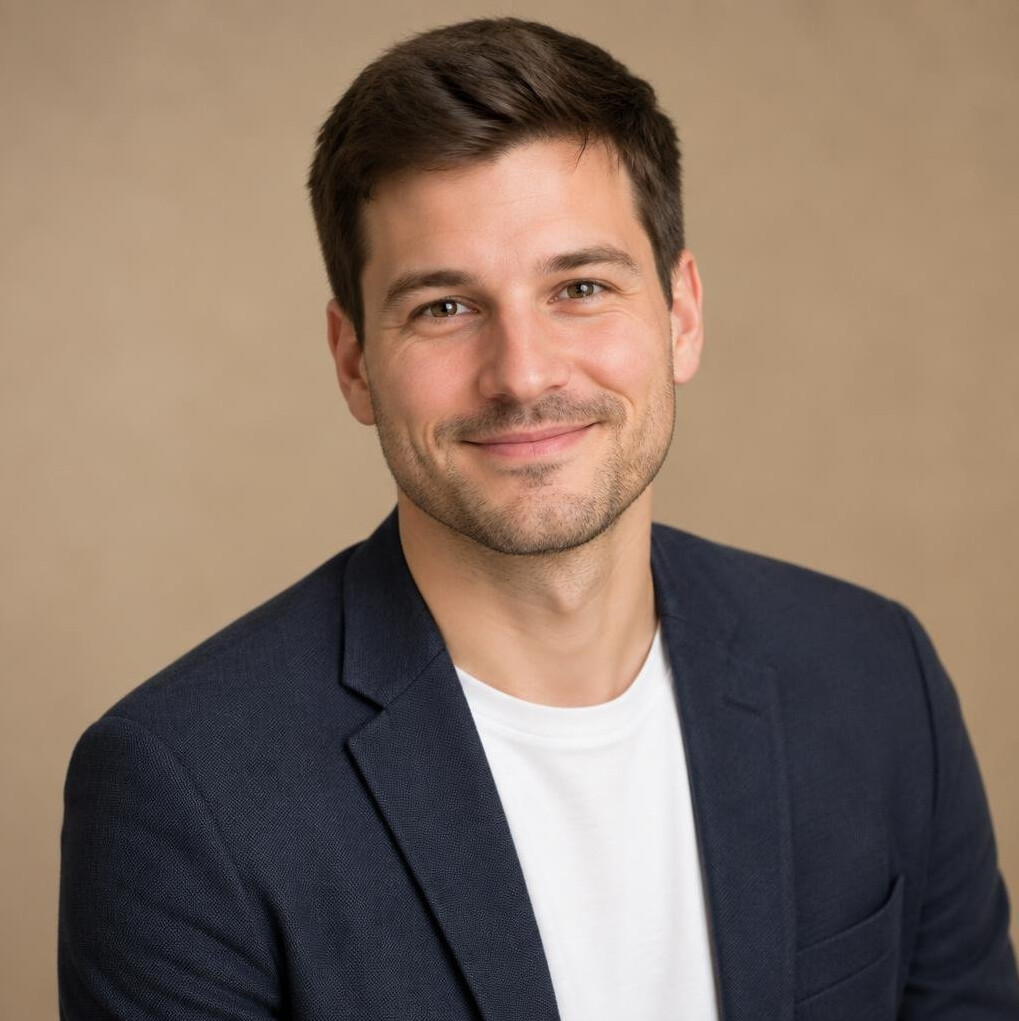 Studio portrait of a German man in his 30s with dark hair