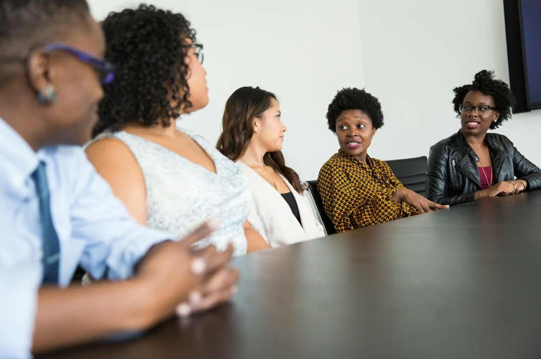 diverse group discussing society