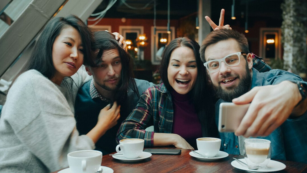 group of friends meeting in cafe