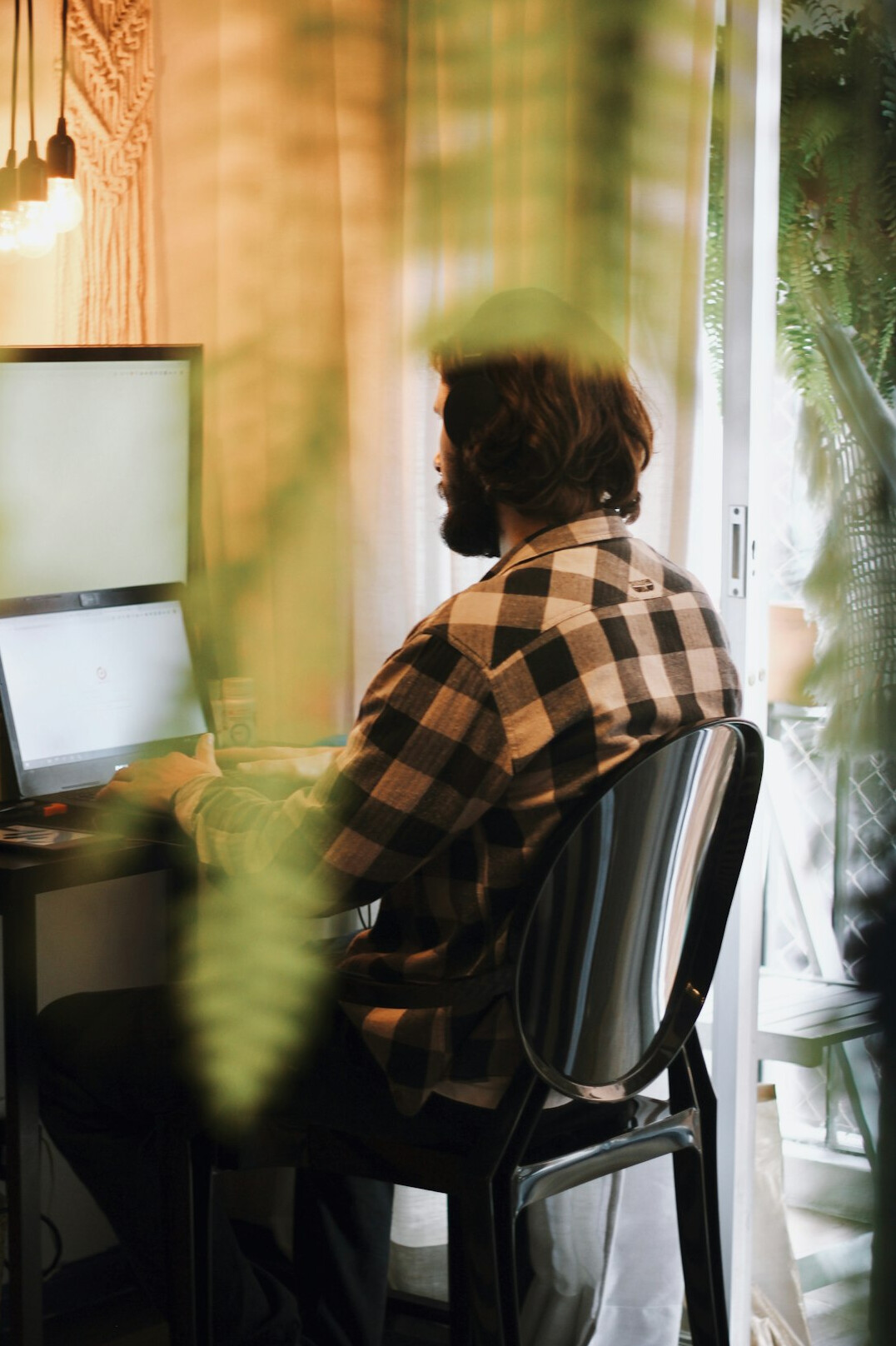 person working on laptop at home